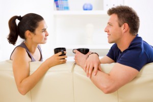 couple-talking-discussing-coffee